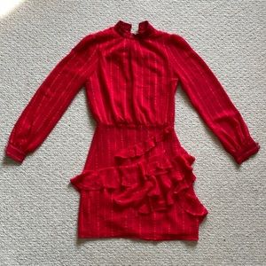 Bright red long sleeve dress with ruffles at waist